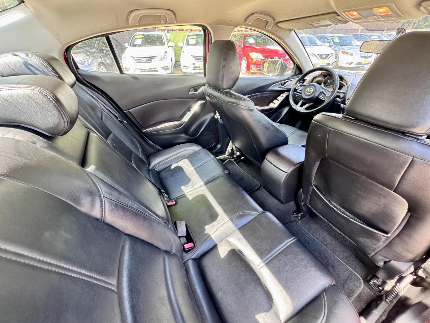 2017 Red /Black Mazda MAZDA3 i Touring AT 4-Door (JM1BN1V76H1) with an 2.0L L4 DOHC 16V engine, Automatic 6-Speed transmission, located at 16710 Clay Rd., Houston, TX, 77084, (281) 859-7900, 29.834864, -95.656166 - Low Dow. Low Payments. - Photo#11