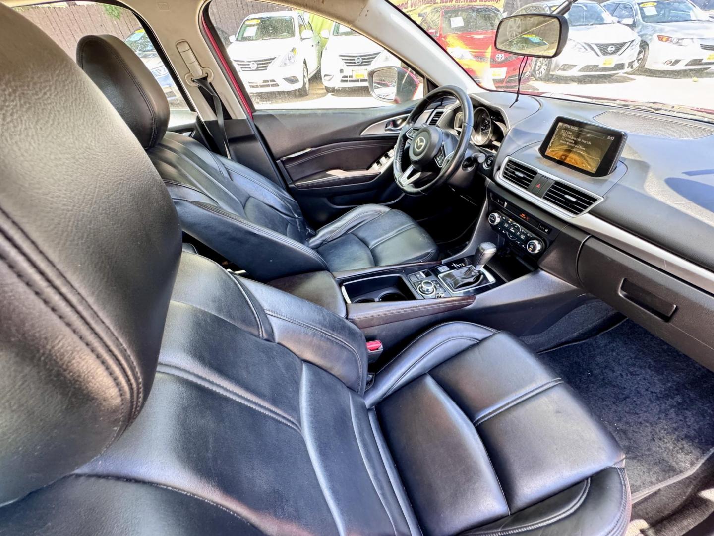 2017 Red /Black Mazda MAZDA3 i Touring AT 4-Door (JM1BN1V76H1) with an 2.0L L4 DOHC 16V engine, Automatic 6-Speed transmission, located at 16710 Clay Rd., Houston, TX, 77084, (281) 859-7900, 29.834864, -95.656166 - Low Dow. Low Payments. - Photo#10