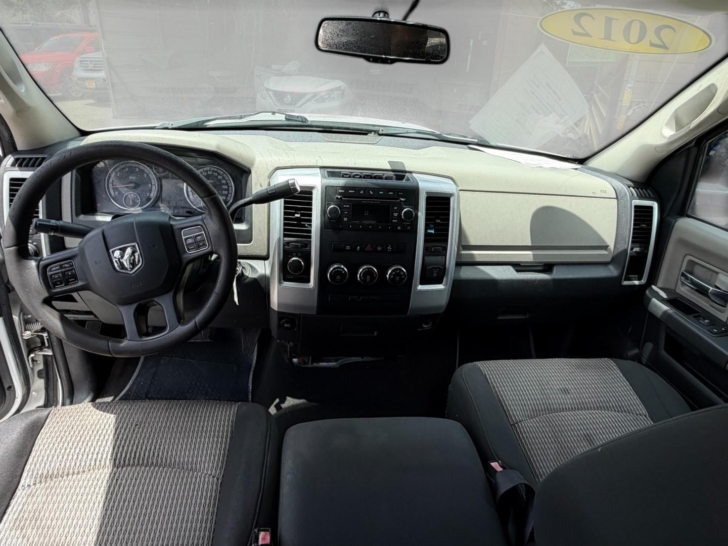 2012 Black Dodge Ram 1500 SLT Quad Cab 4WD (1C6RD7GT0CS) with an 5.7L V8 OHV 16V engine, 5-Speed Automatic transmission, located at 16710 Clay Rd., Houston, TX, 77084, (281) 859-7900, 29.834864, -95.656166 - Low Down. Low Payments- Photo#8