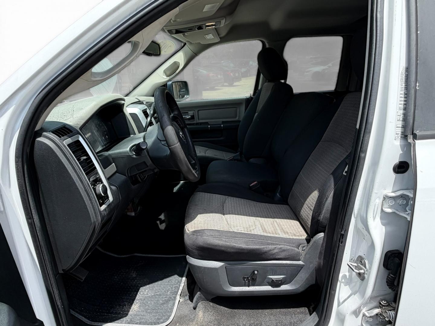 2012 Black Dodge Ram 1500 SLT Quad Cab 4WD (1C6RD7GT0CS) with an 5.7L V8 OHV 16V engine, 5-Speed Automatic transmission, located at 16710 Clay Rd., Houston, TX, 77084, (281) 859-7900, 29.834864, -95.656166 - Low Down. Low Payments- Photo#10