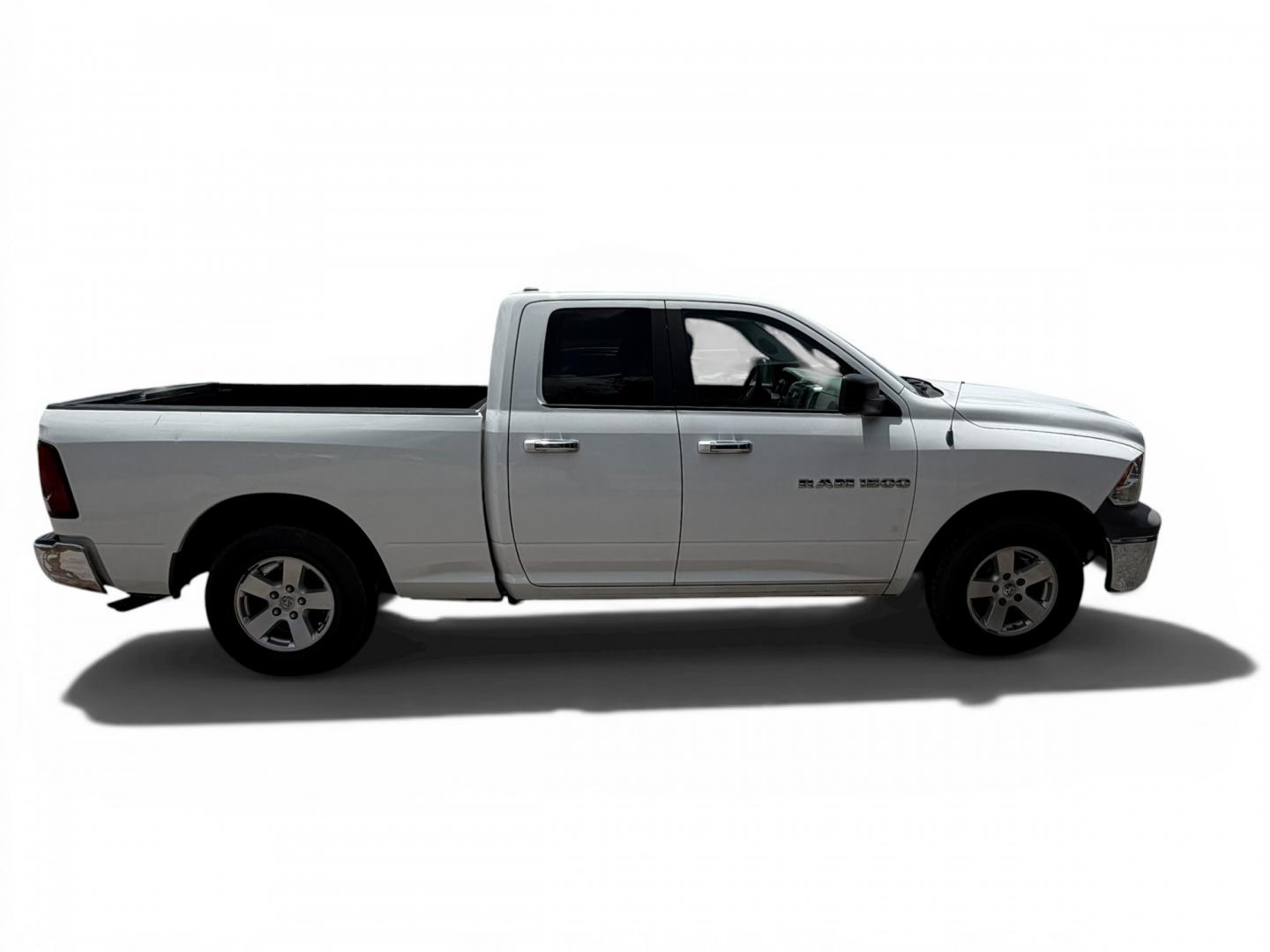 2012 Black Dodge Ram 1500 SLT Quad Cab 4WD (1C6RD7GT0CS) with an 5.7L V8 OHV 16V engine, 5-Speed Automatic transmission, located at 16710 Clay Rd., Houston, TX, 77084, (281) 859-7900, 29.834864, -95.656166 - Low Down. Low Payments- Photo#7