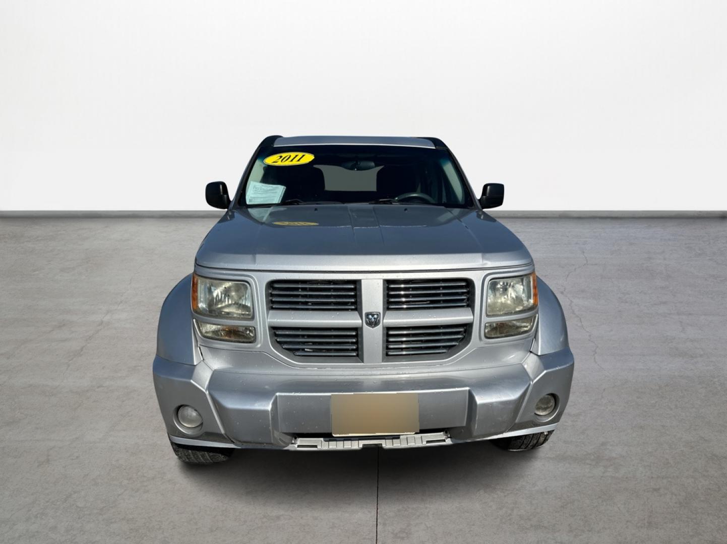 2011 Silver Dodge Nitro Heat 2WD (1D4PT4GK0BW) with an 3.7L V6 SOHC 12V engine, 4-Speed Automatic transmission, located at 16710 Clay Rd., Houston, TX, 77084, (281) 859-7900, 29.834864, -95.656166 - Low Down. Low Payments. - Photo#1