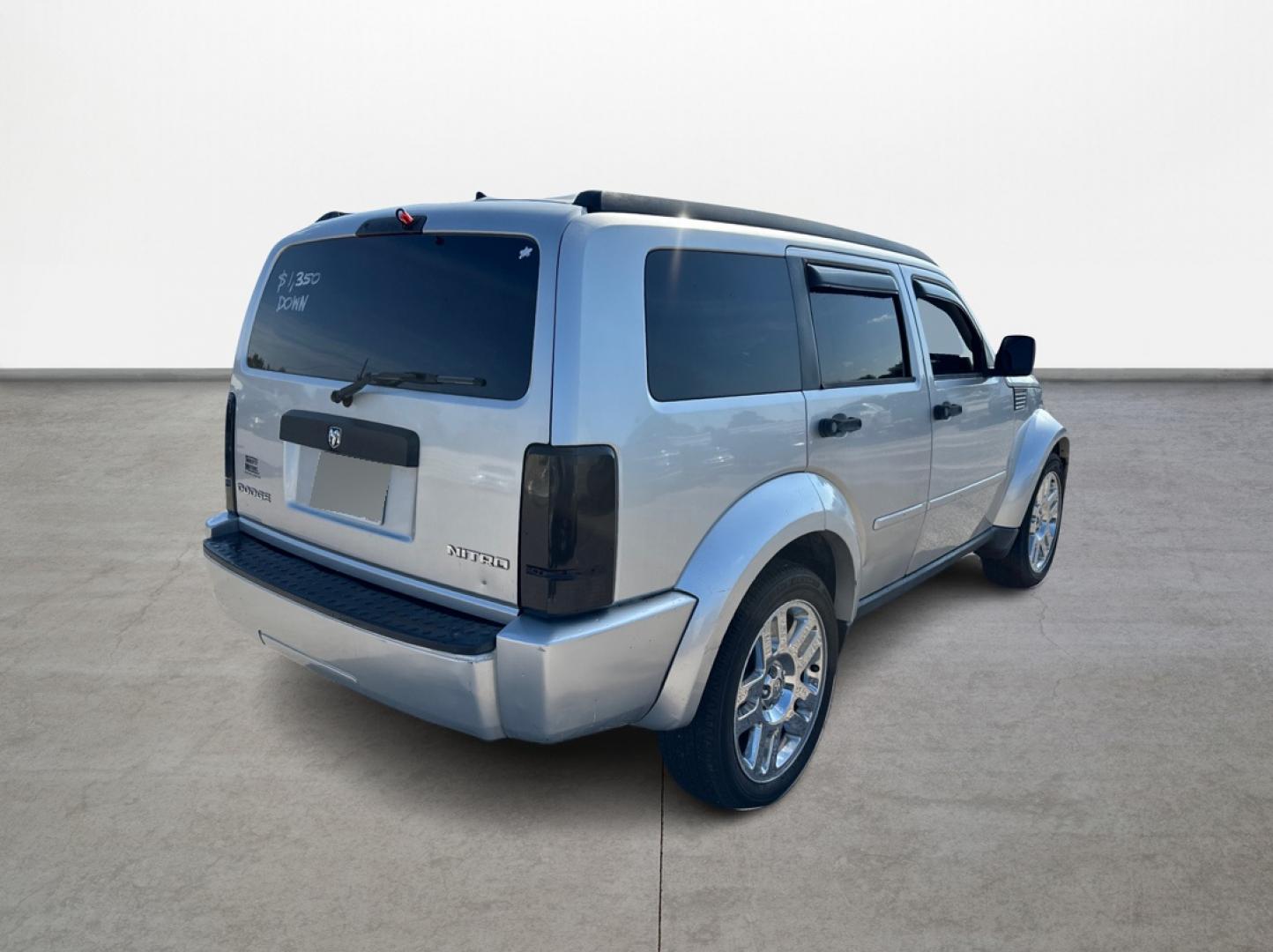 2011 Silver Dodge Nitro Heat 2WD (1D4PT4GK0BW) with an 3.7L V6 SOHC 12V engine, 4-Speed Automatic transmission, located at 16710 Clay Rd., Houston, TX, 77084, (281) 859-7900, 29.834864, -95.656166 - Low Down. Low Payments. - Photo#4