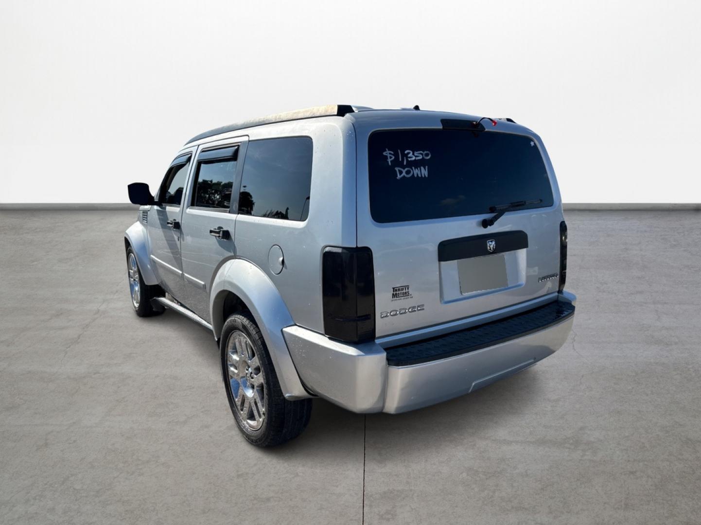 2011 Silver Dodge Nitro Heat 2WD (1D4PT4GK0BW) with an 3.7L V6 SOHC 12V engine, 4-Speed Automatic transmission, located at 16710 Clay Rd., Houston, TX, 77084, (281) 859-7900, 29.834864, -95.656166 - Low Down. Low Payments. - Photo#6