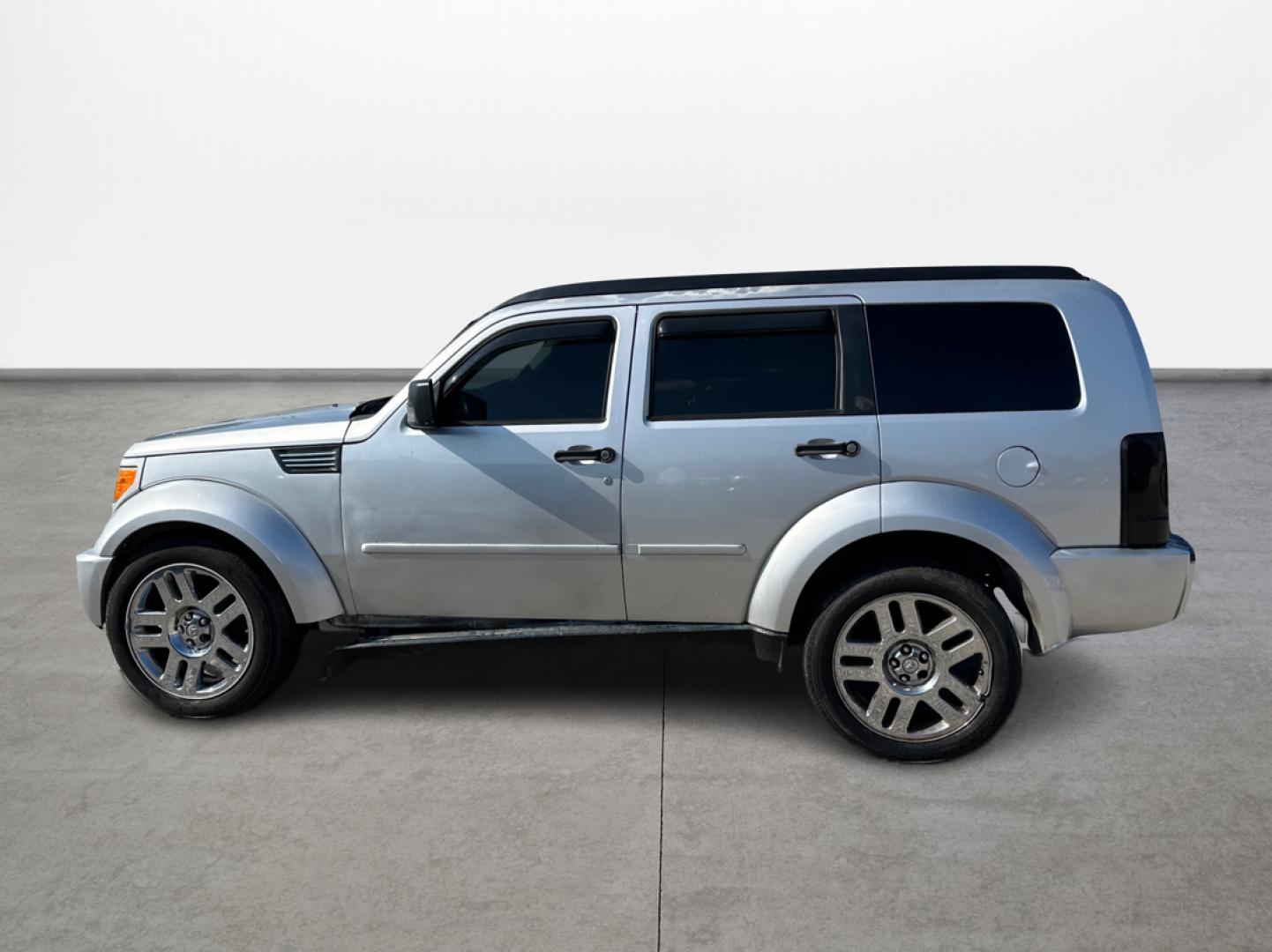 2011 Silver Dodge Nitro Heat 2WD (1D4PT4GK0BW) with an 3.7L V6 SOHC 12V engine, 4-Speed Automatic transmission, located at 16710 Clay Rd., Houston, TX, 77084, (281) 859-7900, 29.834864, -95.656166 - Low Down. Low Payments. - Photo#7