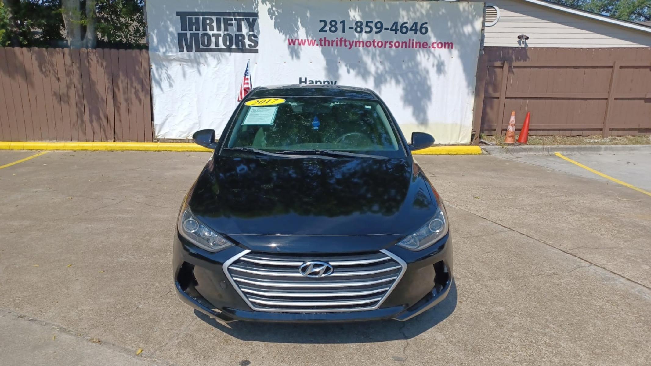 2017 BLACK Hyundai Elantra Limited (KMHD84LF3HU) with an 1.8L L4 DOHC 16V engine, 6A transmission, located at 16710 Clay Rd., Houston, TX, 77084, (281) 859-7900, 29.834864, -95.656166 - Low Down. Low Payments. - Photo #1