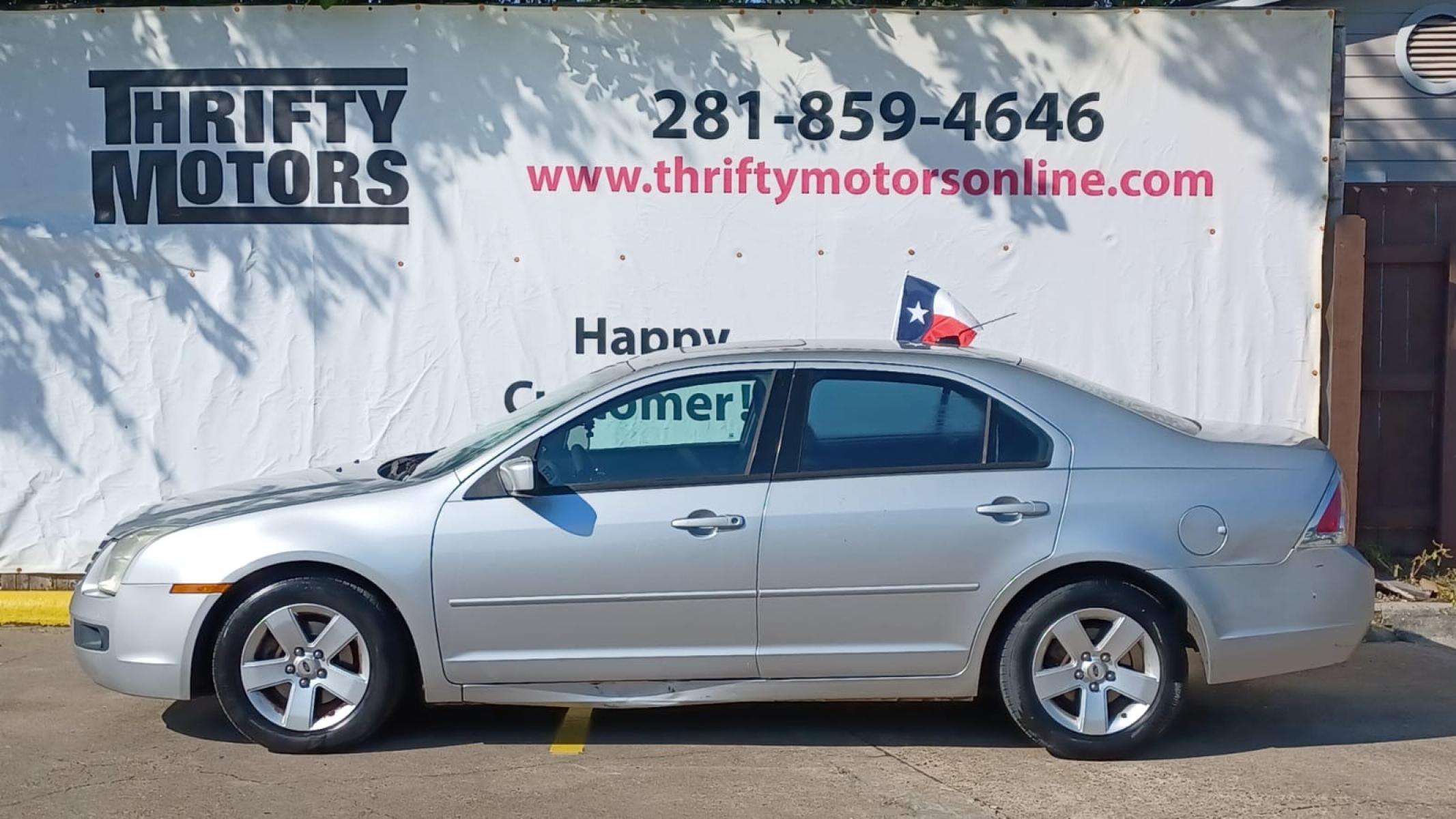 2009 Silver Ford Fusion I4 SE (3FAHP07Z19R) with an 2.3L L4 DOHC 16V engine, located at 16710 Clay Rd., Houston, TX, 77084, (281) 859-7900, 29.834864, -95.656166 - Photo #0