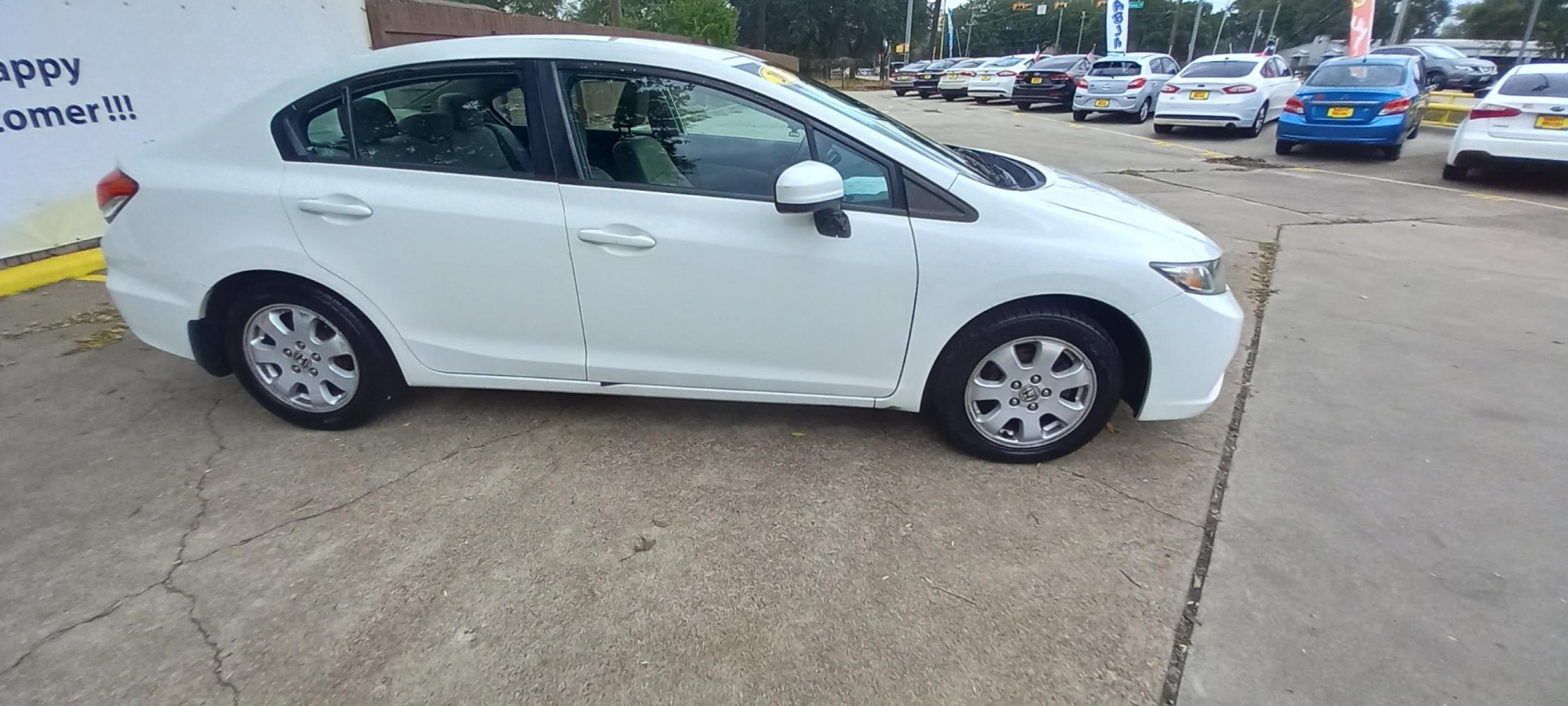 2015 White Honda Civic LX Sedan CVT (2HGFB2F56FH) with an 1.8L L4 SOHC 16V engine, Continuously Variable Transmission transmission, located at 16710 Clay Rd., Houston, TX, 77084, (281) 859-7900, 29.834864, -95.656166 - Low Down. Low Payments. - Photo #4
