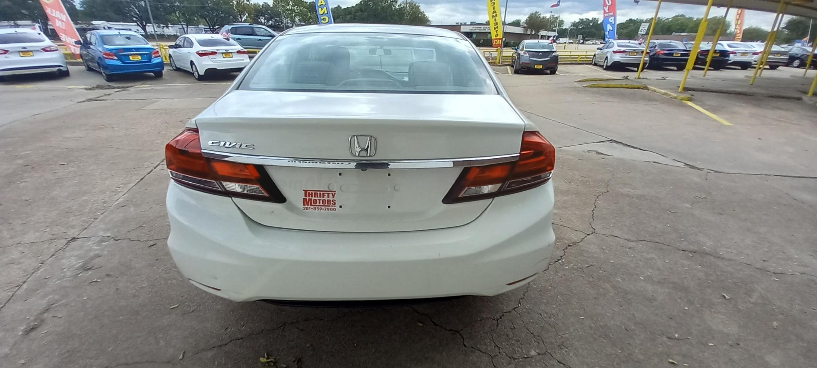 2015 White Honda Civic LX Sedan CVT (2HGFB2F56FH) with an 1.8L L4 SOHC 16V engine, Continuously Variable Transmission transmission, located at 16710 Clay Rd., Houston, TX, 77084, (281) 859-7900, 29.834864, -95.656166 - Low Down. Low Payments. - Photo #5