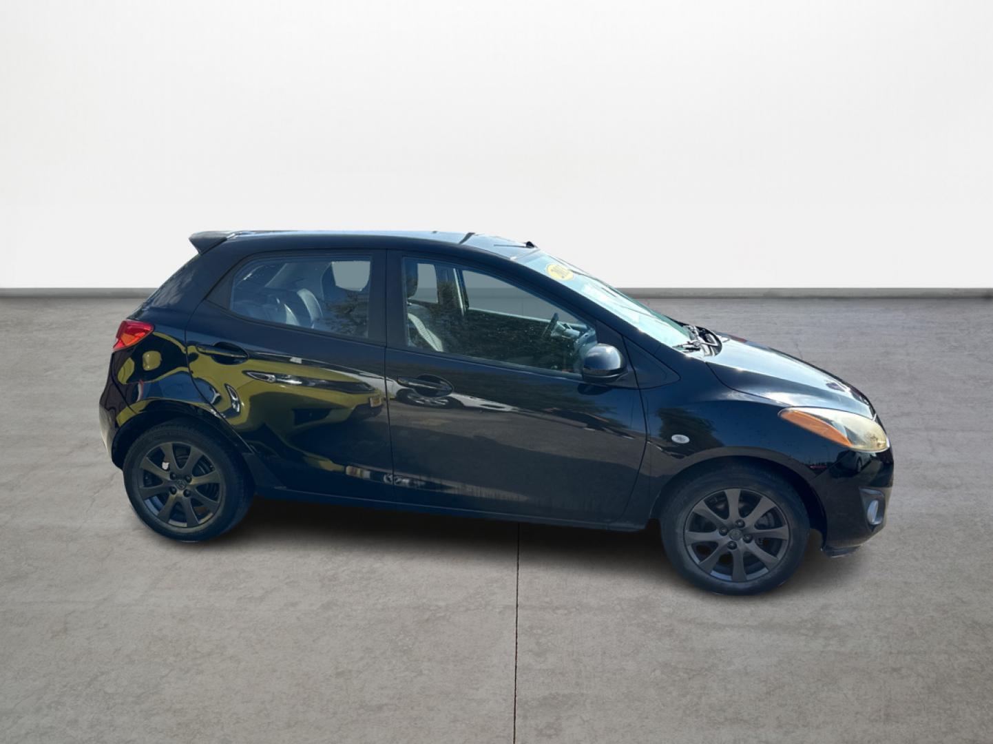 2013 BLACK Mazda MAZDA2 Touring (JM1DE1LY7D0) with an 1.5L L4 DOHC 16V engine, located at 16710 Clay Rd., Houston, TX, 77084, (281) 859-7900, 29.834864, -95.656166 - Photo#3