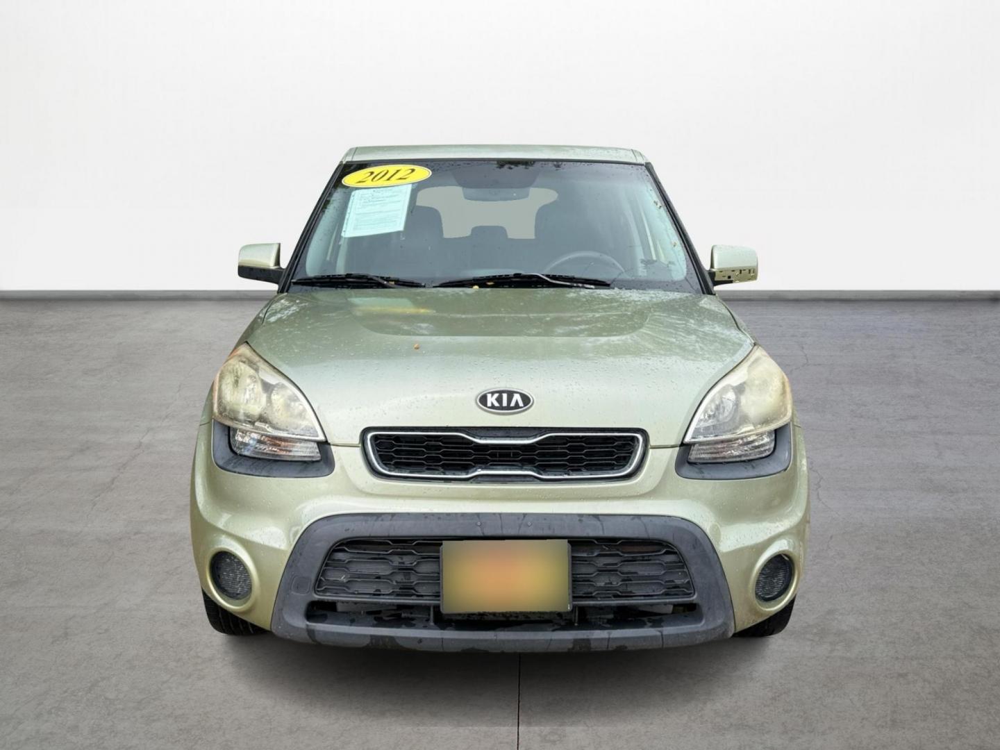 2012 Green /Gray Kia Soul Base (KNDJT2A53C7) with an 1.6L L4 DOHC 16V engine, 5-Speed Automatic transmission, located at 16710 Clay Rd., Houston, TX, 77084, (281) 859-7900, 29.834864, -95.656166 - Low Down. Low Payments. - Photo#1
