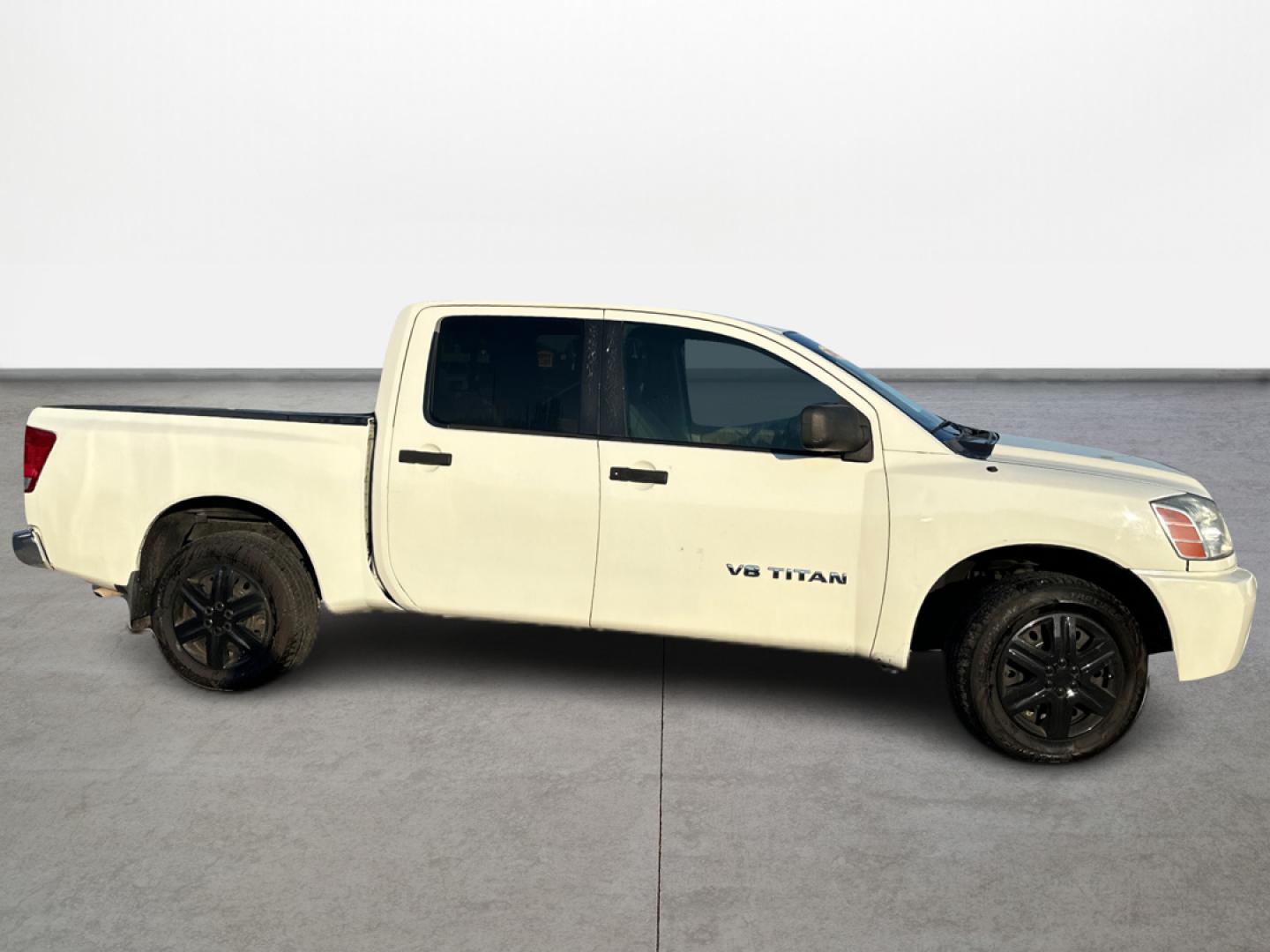 2008 White /Gray Nissan Titan (1N6BA07D48N) with an 5.6L V8 5.6L V8 engine, Automatic 5-Speed transmission, located at 16710 Clay Rd., Houston, TX, 77084, (281) 859-7900, 29.834864, -95.656166 - Low Down. Low Payments. - Photo#3