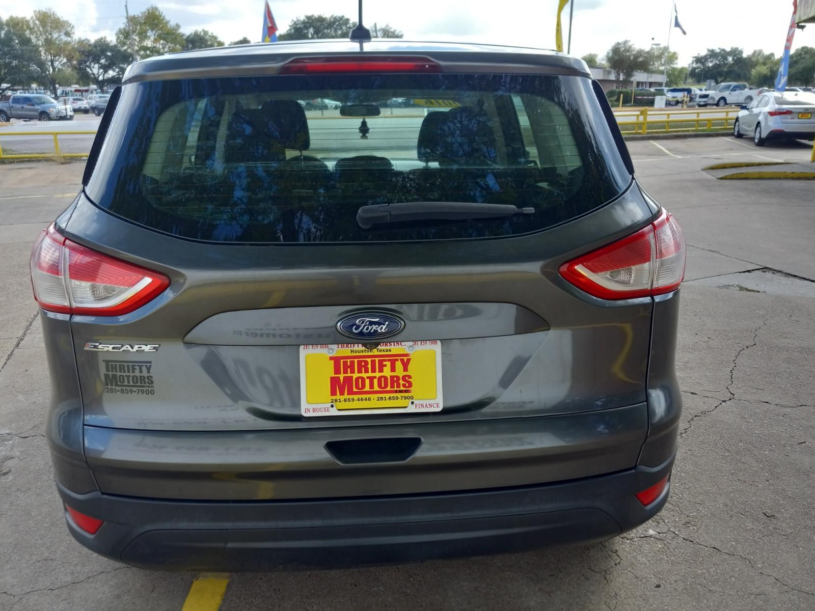 2015 Gray Ford Escape S FWD (1FMCU0F77FU) with an 2.5L L4 DOHC 16V engine, 6-Speed Automatic transmission, located at 16710 Clay Rd., Houston, TX, 77084, (281) 859-7900, 29.834864, -95.656166 - Low Down. Low Payments. - Photo #5