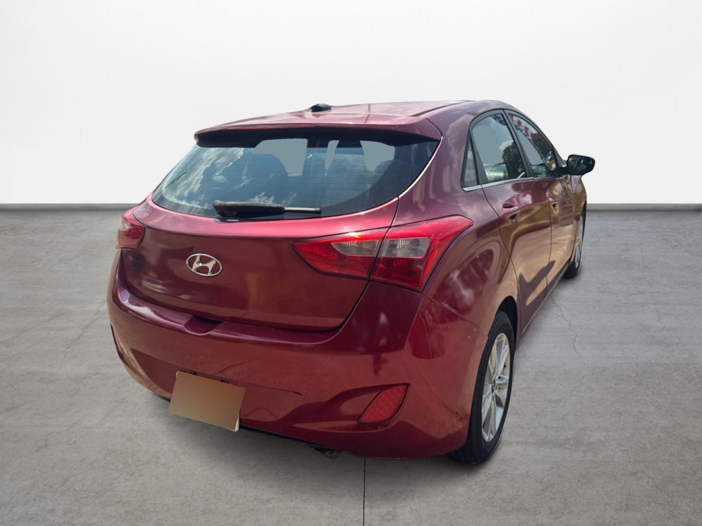 2014 Red Hyundai Elantra GT A/T (KMHD35LH7EU) with an 2.0L L4 16V DOHC engine, 6-Speed Automatic transmission, located at 16710 Clay Rd., Houston, TX, 77084, (281) 859-7900, 29.834864, -95.656166 - Low Down. Low Payments. - Photo#2