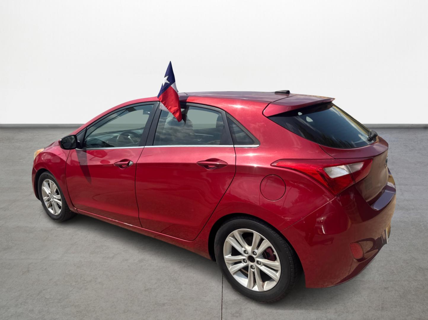 2014 Red Hyundai Elantra GT A/T (KMHD35LH7EU) with an 2.0L L4 16V DOHC engine, 6-Speed Automatic transmission, located at 16710 Clay Rd., Houston, TX, 77084, (281) 859-7900, 29.834864, -95.656166 - Low Down. Low Payments. - Photo#4