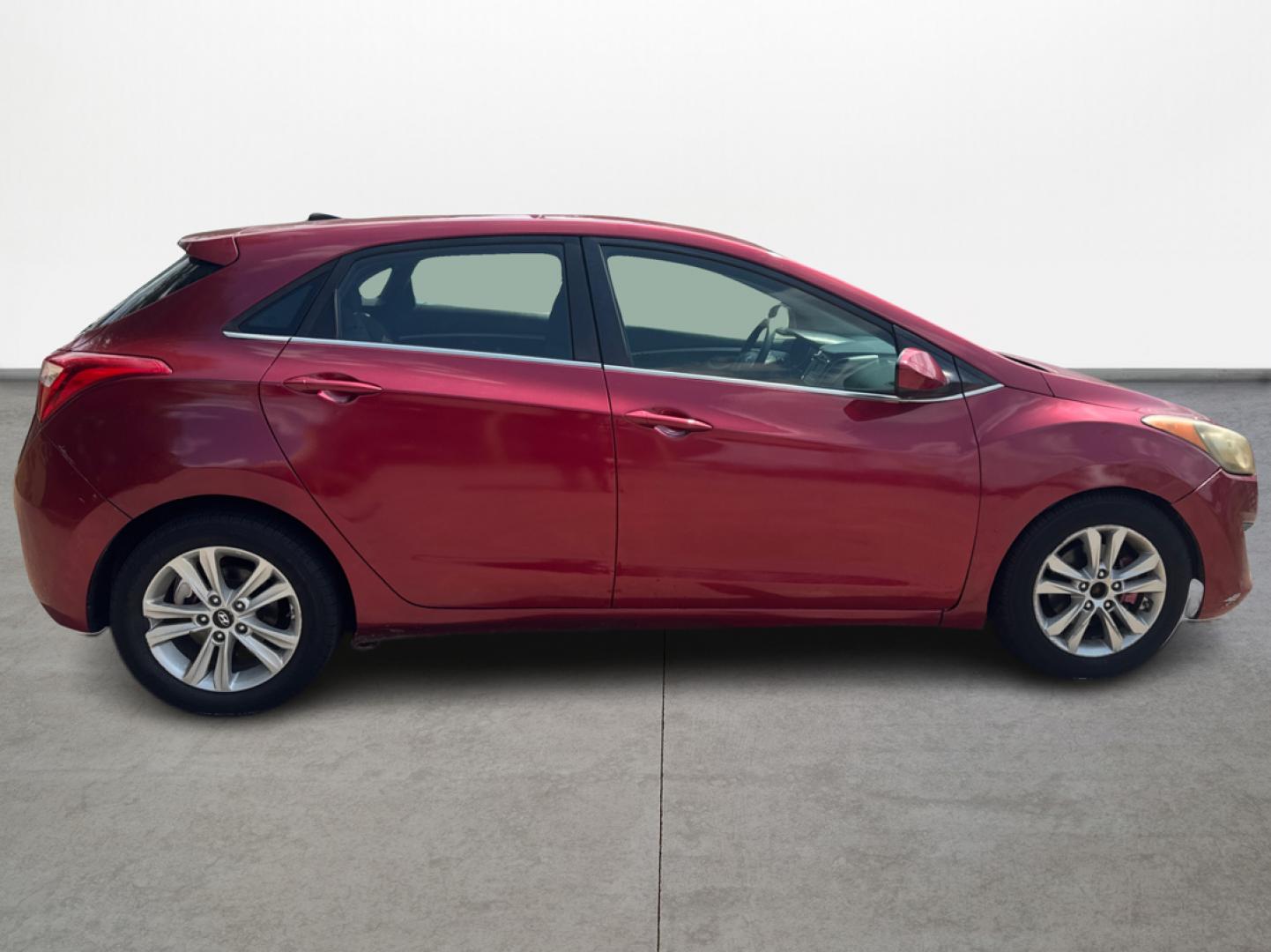 2014 Red Hyundai Elantra GT A/T (KMHD35LH7EU) with an 2.0L L4 16V DOHC engine, 6-Speed Automatic transmission, located at 16710 Clay Rd., Houston, TX, 77084, (281) 859-7900, 29.834864, -95.656166 - Low Down. Low Payments. - Photo#7