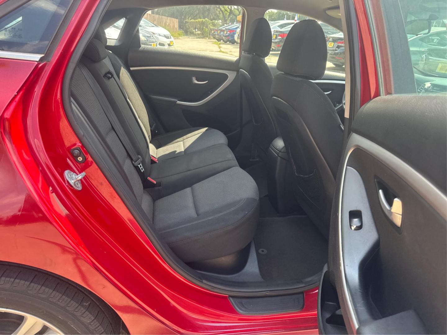 2014 Red Hyundai Elantra GT A/T (KMHD35LH7EU) with an 2.0L L4 16V DOHC engine, 6-Speed Automatic transmission, located at 16710 Clay Rd., Houston, TX, 77084, (281) 859-7900, 29.834864, -95.656166 - Low Down. Low Payments. - Photo#10