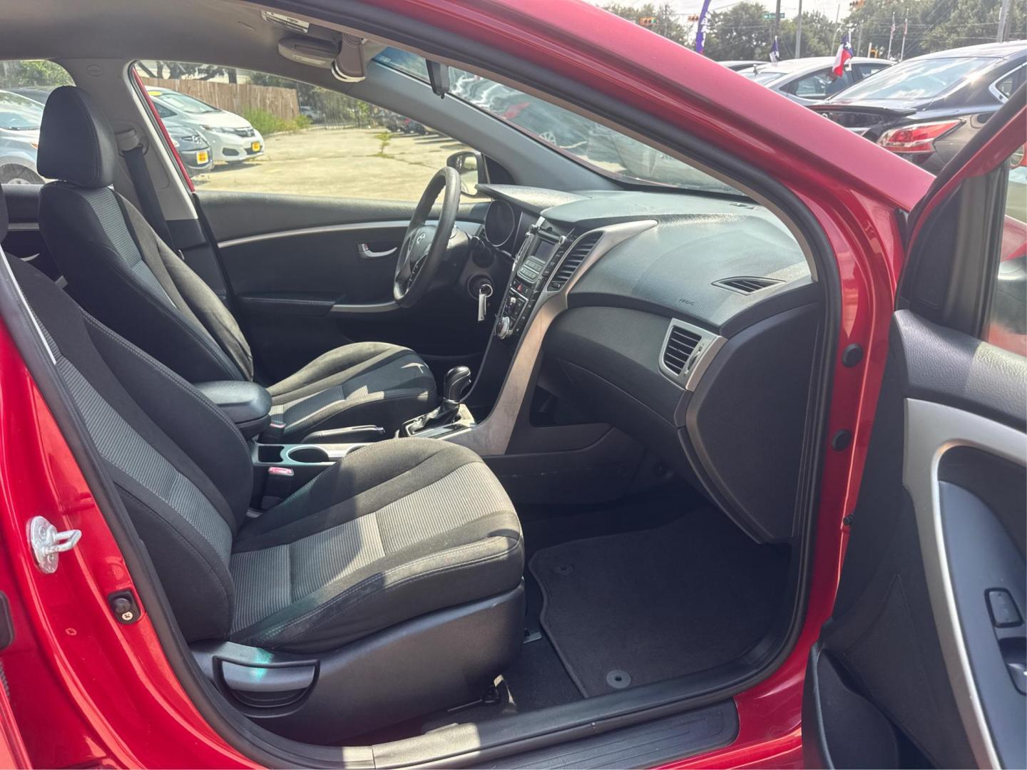 2014 Red Hyundai Elantra GT A/T (KMHD35LH7EU) with an 2.0L L4 16V DOHC engine, 6-Speed Automatic transmission, located at 16710 Clay Rd., Houston, TX, 77084, (281) 859-7900, 29.834864, -95.656166 - Low Down. Low Payments. - Photo#11
