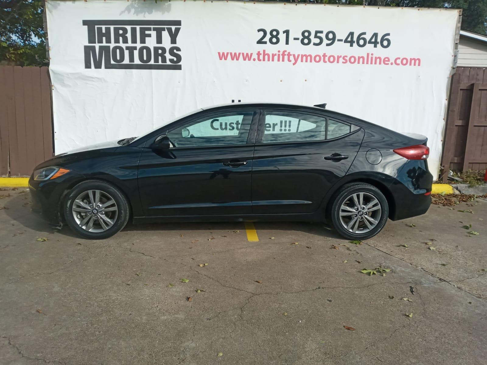 2017 BLACK Hyundai Elantra Limited (5NPD84LF4HH) with an 1.8L L4 DOHC 16V engine, 6A transmission, located at 16710 Clay Rd., Houston, TX, 77084, (281) 859-7900, 29.834864, -95.656166 - Low Down. Low Payments. - Photo #0