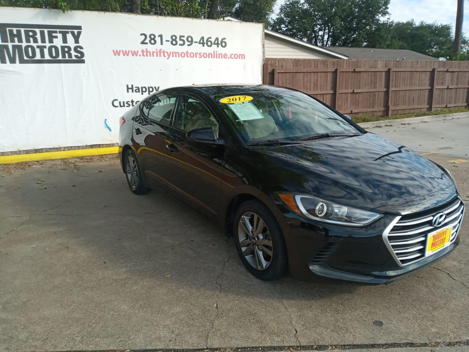2017 BLACK Hyundai Elantra Limited (5NPD84LF4HH) with an 1.8L L4 DOHC 16V engine, 6A transmission, located at 16710 Clay Rd., Houston, TX, 77084, (281) 859-7900, 29.834864, -95.656166 - Low Down. Low Payments. - Photo #3