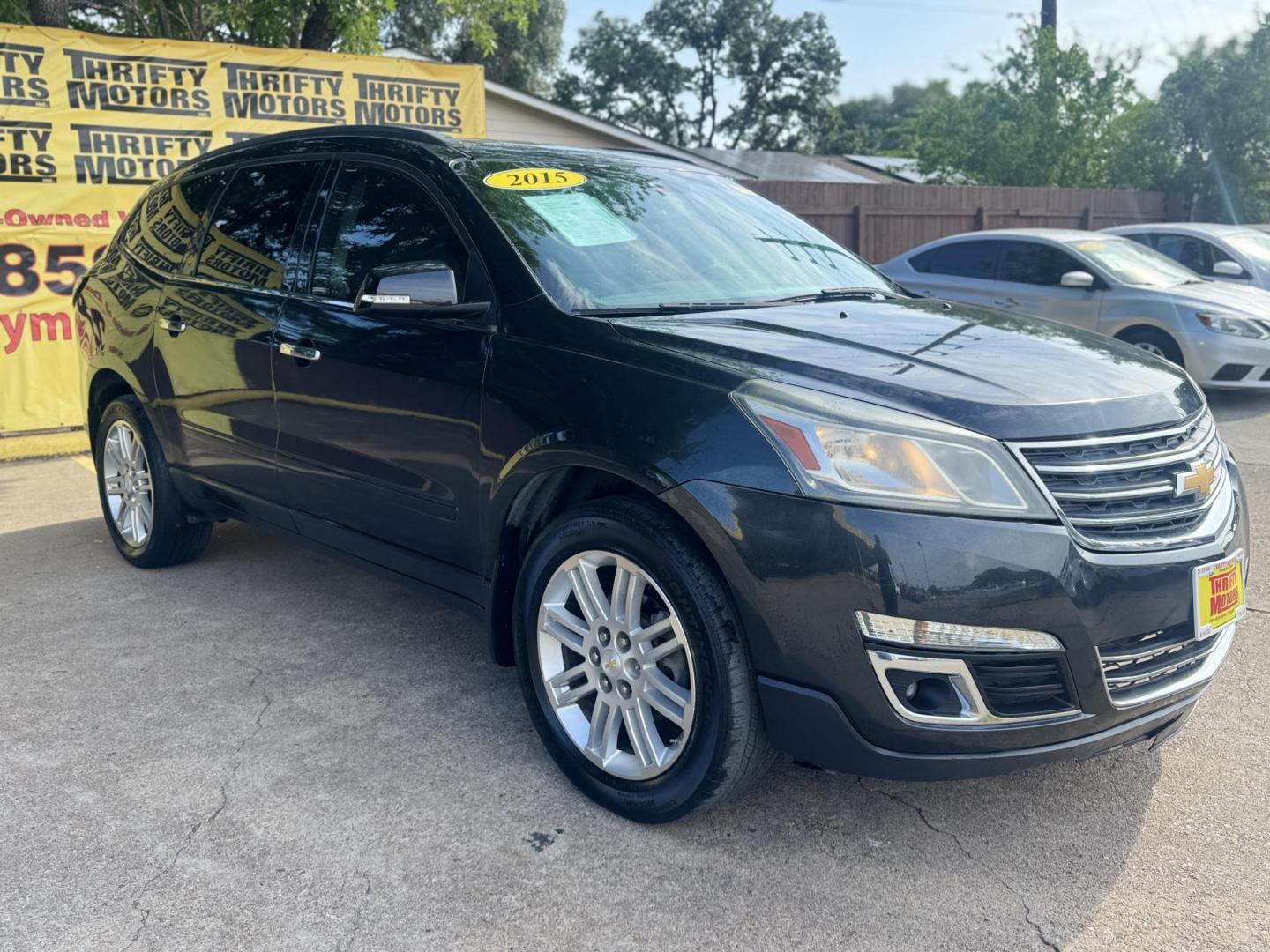 2015 BLACK /Gray Chevrolet Traverse 1LT FWD (1GNKRGKD3FJ) with an 3.6L V6 DOHC 24V engine, 6-Speed Automatic transmission, located at 16710 Clay Rd., Houston, TX, 77084, (281) 859-7900, 29.834864, -95.656166 - Low Down. Low Payments. - Photo#2