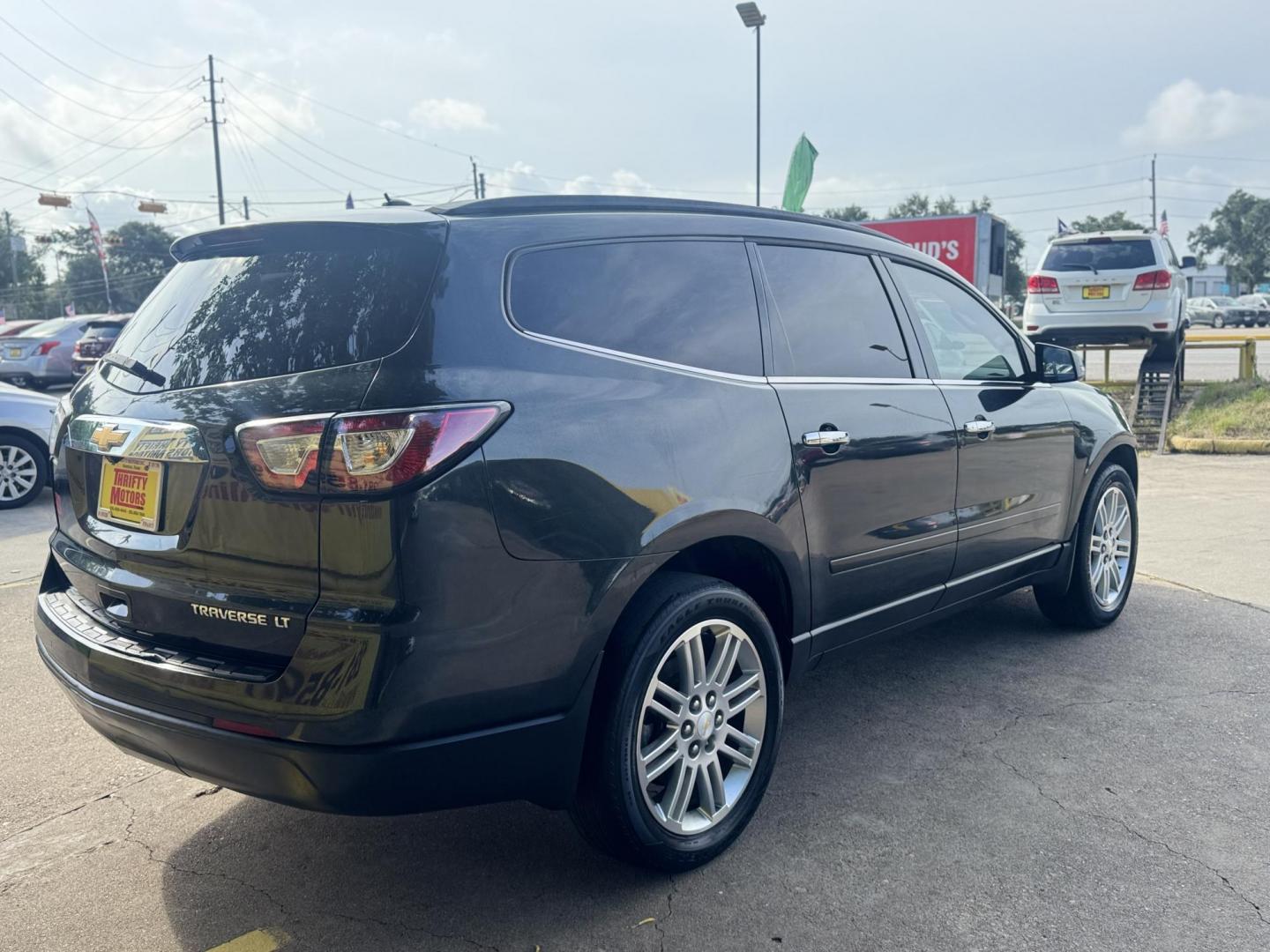 2015 BLACK /Gray Chevrolet Traverse 1LT FWD (1GNKRGKD3FJ) with an 3.6L V6 DOHC 24V engine, 6-Speed Automatic transmission, located at 16710 Clay Rd., Houston, TX, 77084, (281) 859-7900, 29.834864, -95.656166 - Low Down. Low Payments. - Photo#6