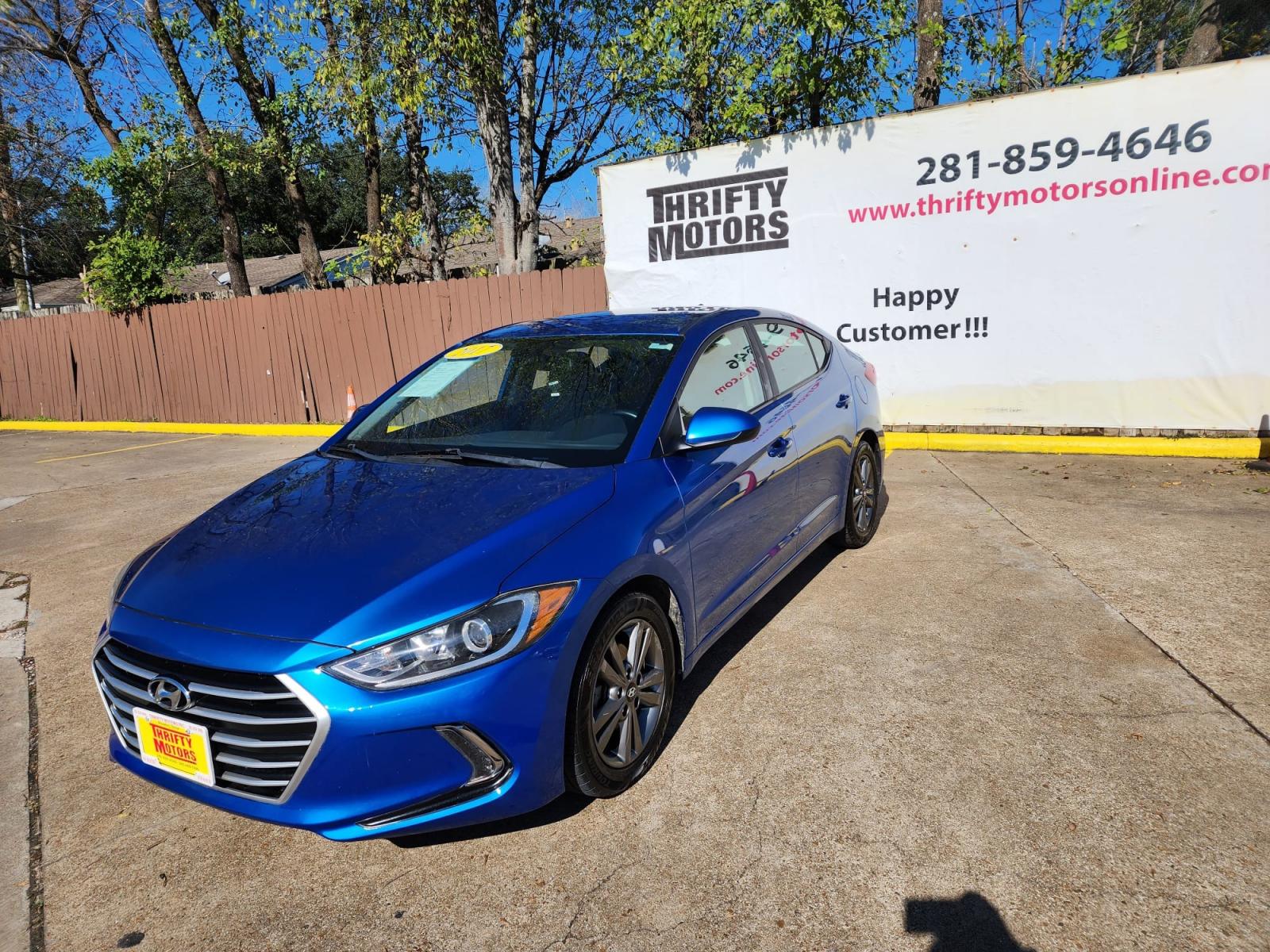2017 Blue Hyundai Elantra Limited (5NPD84LF2HH) with an 1.8L L4 DOHC 16V engine, 6A transmission, located at 16710 Clay Rd., Houston, TX, 77084, (281) 859-7900, 29.834864, -95.656166 - Low Dow. Low Payments. - Photo #3