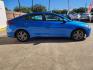 2017 Blue Hyundai Elantra Limited (5NPD84LF2HH) with an 1.8L L4 DOHC 16V engine, 6A transmission, located at 16710 Clay Rd., Houston, TX, 77084, (281) 859-7900, 29.834864, -95.656166 - Photo#4