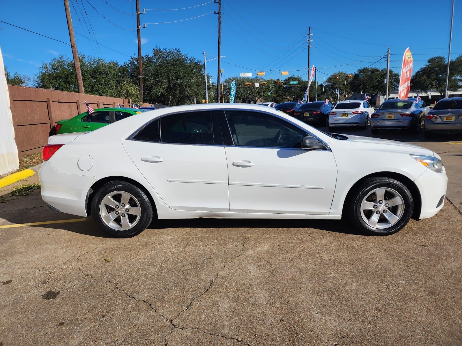 2015 White Chevrolet Malibu LS Fleet (1G11A5SL7FF) with an 2.5L L4 DOHC 16V engine, 6-Speed Automatic transmission, located at 16710 Clay Rd., Houston, TX, 77084, (281) 859-7900, 29.834864, -95.656166 - Low Down. Low Payments. - Photo #4