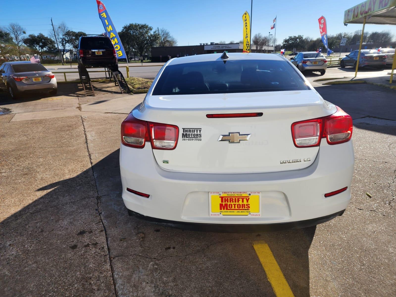 2015 White Chevrolet Malibu LS Fleet (1G11A5SL7FF) with an 2.5L L4 DOHC 16V engine, 6-Speed Automatic transmission, located at 16710 Clay Rd., Houston, TX, 77084, (281) 859-7900, 29.834864, -95.656166 - Low Down. Low Payments. - Photo #5