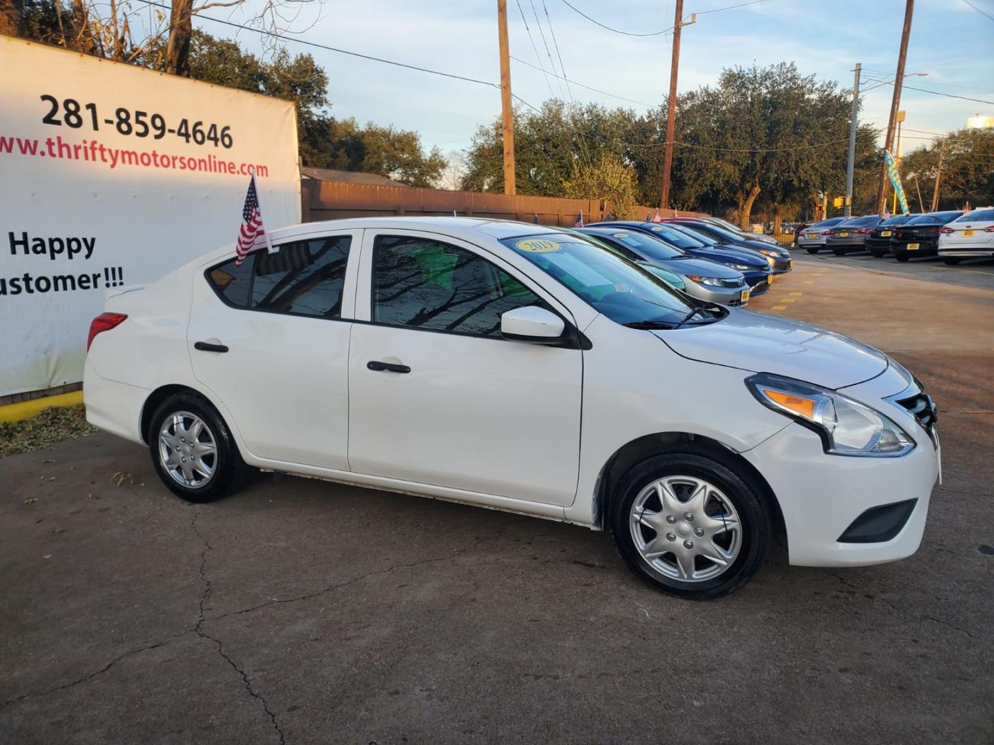 2019 White /Gray Nissan Versa 1.6 SV Sedan (3N1CN7AP6KL) with an 1.6L L4 DOHC 16V engine, Automatic transmission, located at 16710 Clay Rd., Houston, TX, 77084, (281) 859-7900, 29.834864, -95.656166 - Low Down. Low Payments. - Photo#1