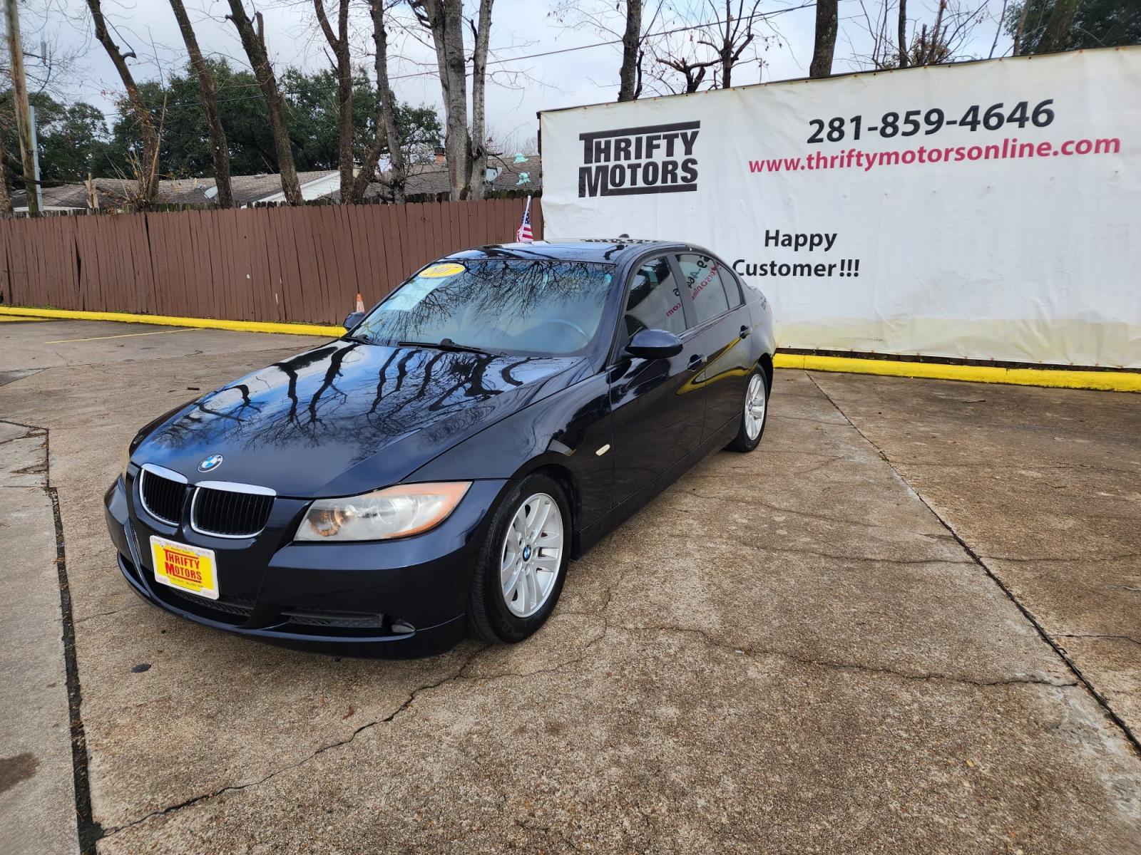 2007 Blue BMW 3-Series 328i (WBAVA33557K) with an 3.0L L6 DOHC 24V engine, located at 16710 Clay Rd., Houston, TX, 77084, (281) 859-7900, 29.834864, -95.656166 - Cash. - Photo #2