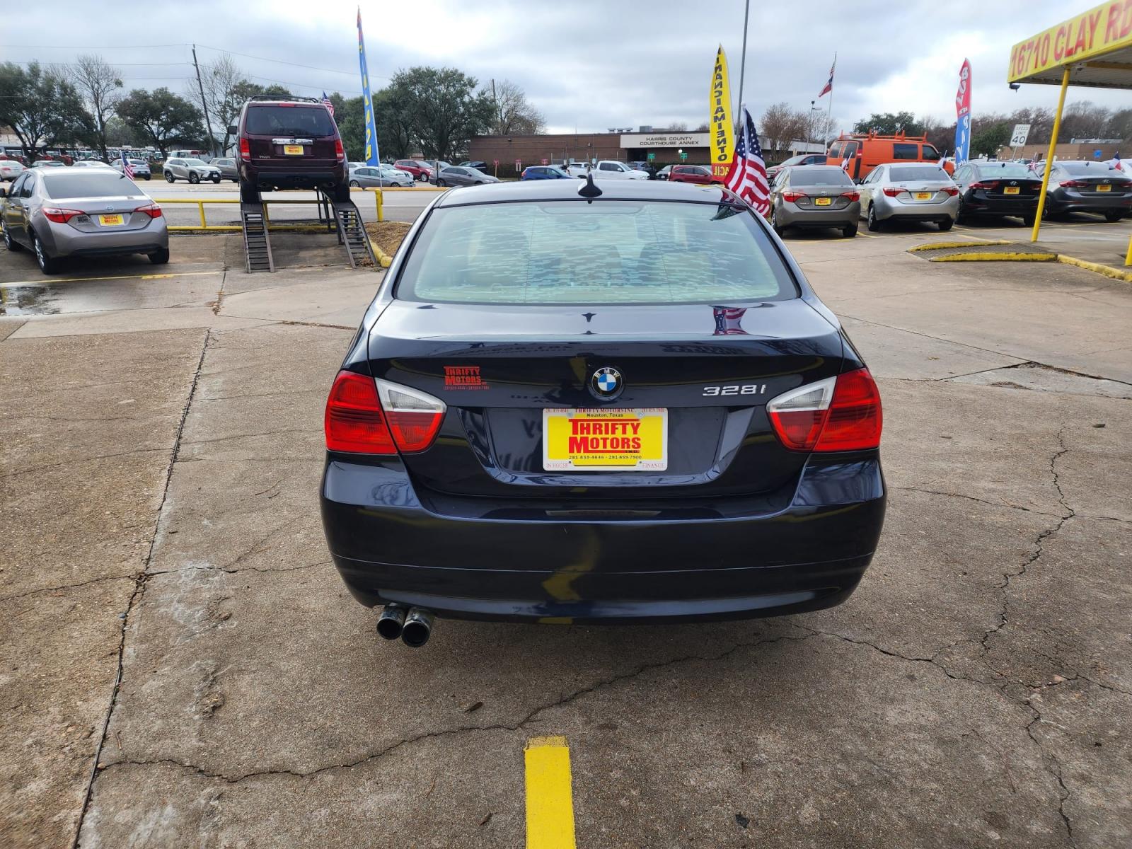 2007 Blue BMW 3-Series 328i (WBAVA33557K) with an 3.0L L6 DOHC 24V engine, located at 16710 Clay Rd., Houston, TX, 77084, (281) 859-7900, 29.834864, -95.656166 - Cash. - Photo #4