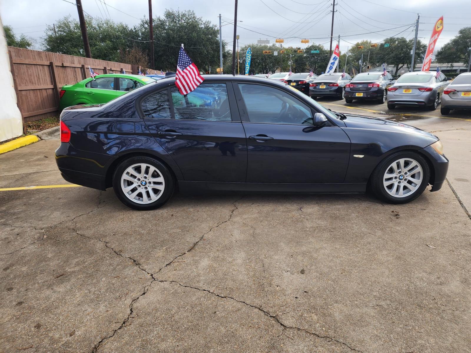 2007 Blue BMW 3-Series 328i (WBAVA33557K) with an 3.0L L6 DOHC 24V engine, located at 16710 Clay Rd., Houston, TX, 77084, (281) 859-7900, 29.834864, -95.656166 - Cash. - Photo #5