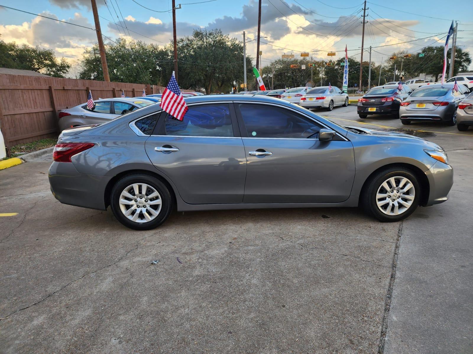 2018 Silver Nissan Altima 2.5 (1N4AL3AP4JC) with an 2.5L L4 DOHC 16V engine, CVT transmission, located at 16710 Clay Rd., Houston, TX, 77084, (281) 859-7900, 29.834864, -95.656166 - Low Down. Low Payments. - Photo #1
