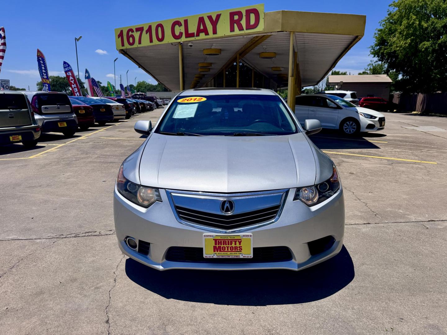 2012 Silver Acura TSX 5-Speed AT with Tech Package (JH4CU2F69CC) with an 2.4L L4 DOHC 16V engine, 5-Speed Automatic transmission, located at 16710 Clay Rd., Houston, TX, 77084, (281) 859-7900, 29.834864, -95.656166 - Low Down. Low Payments. - Photo#1