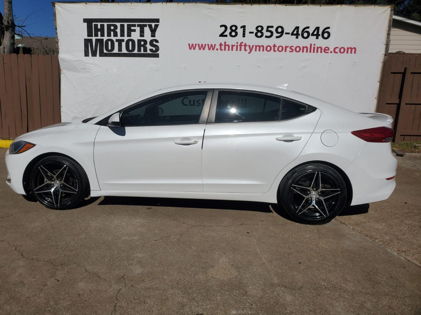 2017 White /Gray Hyundai Elantra SE 6AT (5NPD74LF0HH) with an 1.8L L4 DOHC 16V engine, Automatic 6-Speed transmission, located at 16710 Clay Rd., Houston, TX, 77084, (281) 859-7900, 29.834864, -95.656166 - Low Down. Low Payments. - Photo#3