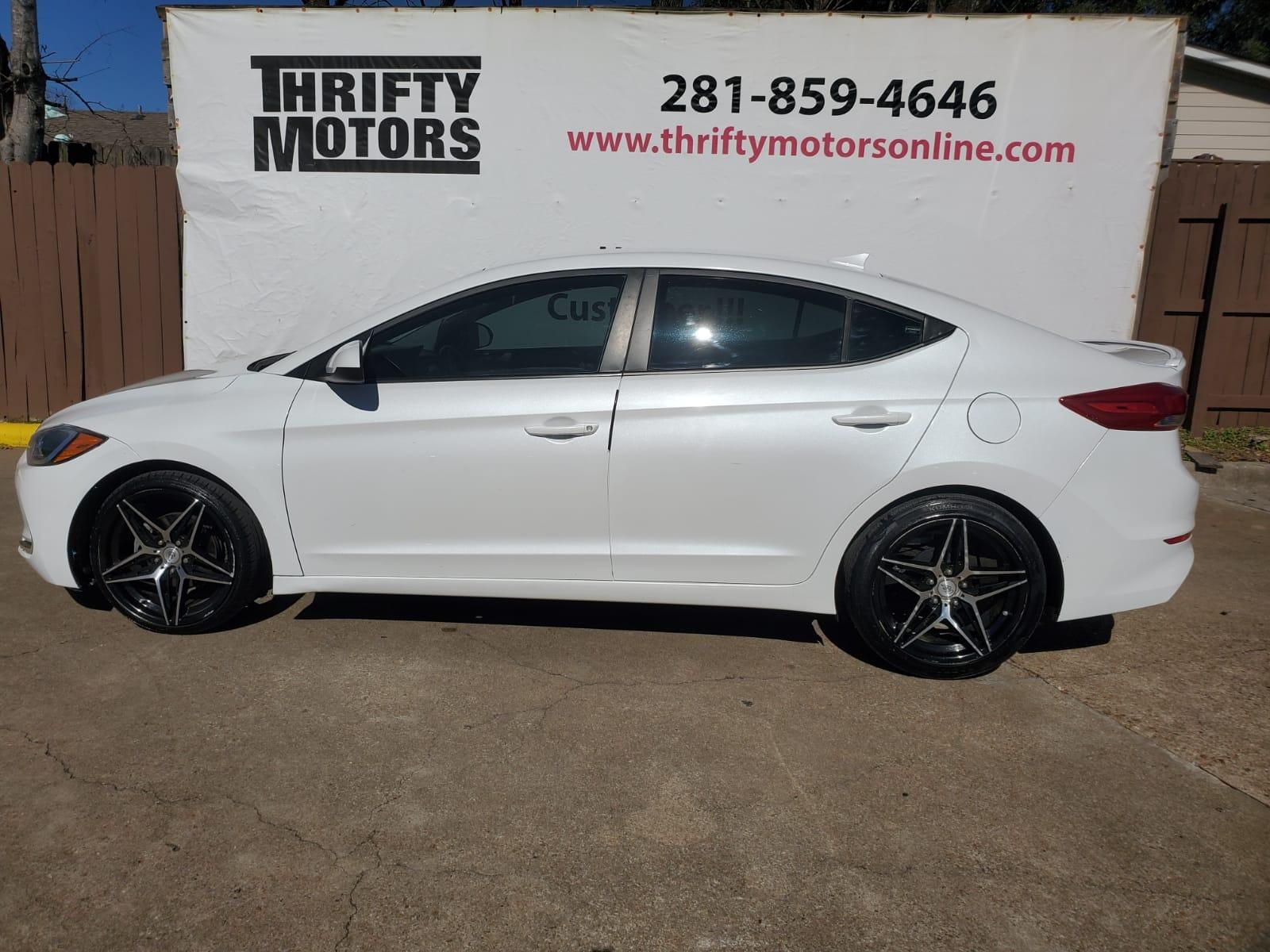 2017 White Hyundai Elantra SE 6AT (5NPD74LF0HH) with an 1.8L L4 DOHC 16V engine, 6A transmission, located at 16710 Clay Rd., Houston, TX, 77084, (281) 859-7900, 29.834864, -95.656166 - Low Down. Low Payments. - Photo #0