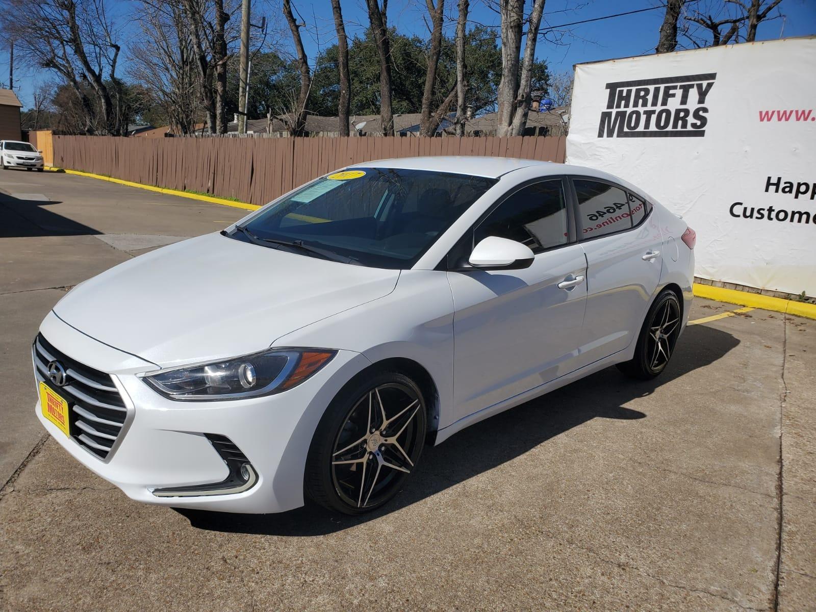2017 White Hyundai Elantra SE 6AT (5NPD74LF0HH) with an 1.8L L4 DOHC 16V engine, 6A transmission, located at 16710 Clay Rd., Houston, TX, 77084, (281) 859-7900, 29.834864, -95.656166 - Low Down. Low Payments. - Photo #2