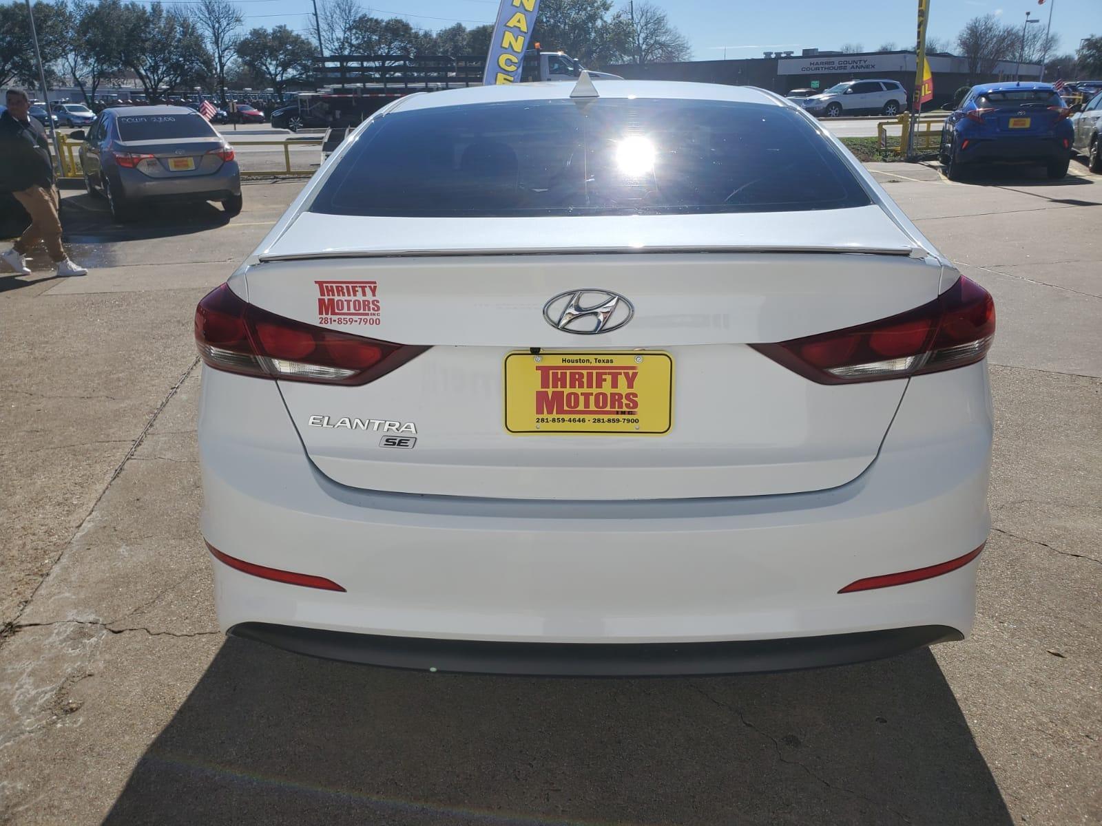 2017 White Hyundai Elantra SE 6AT (5NPD74LF0HH) with an 1.8L L4 DOHC 16V engine, 6A transmission, located at 16710 Clay Rd., Houston, TX, 77084, (281) 859-7900, 29.834864, -95.656166 - Low Down. Low Payments. - Photo #4
