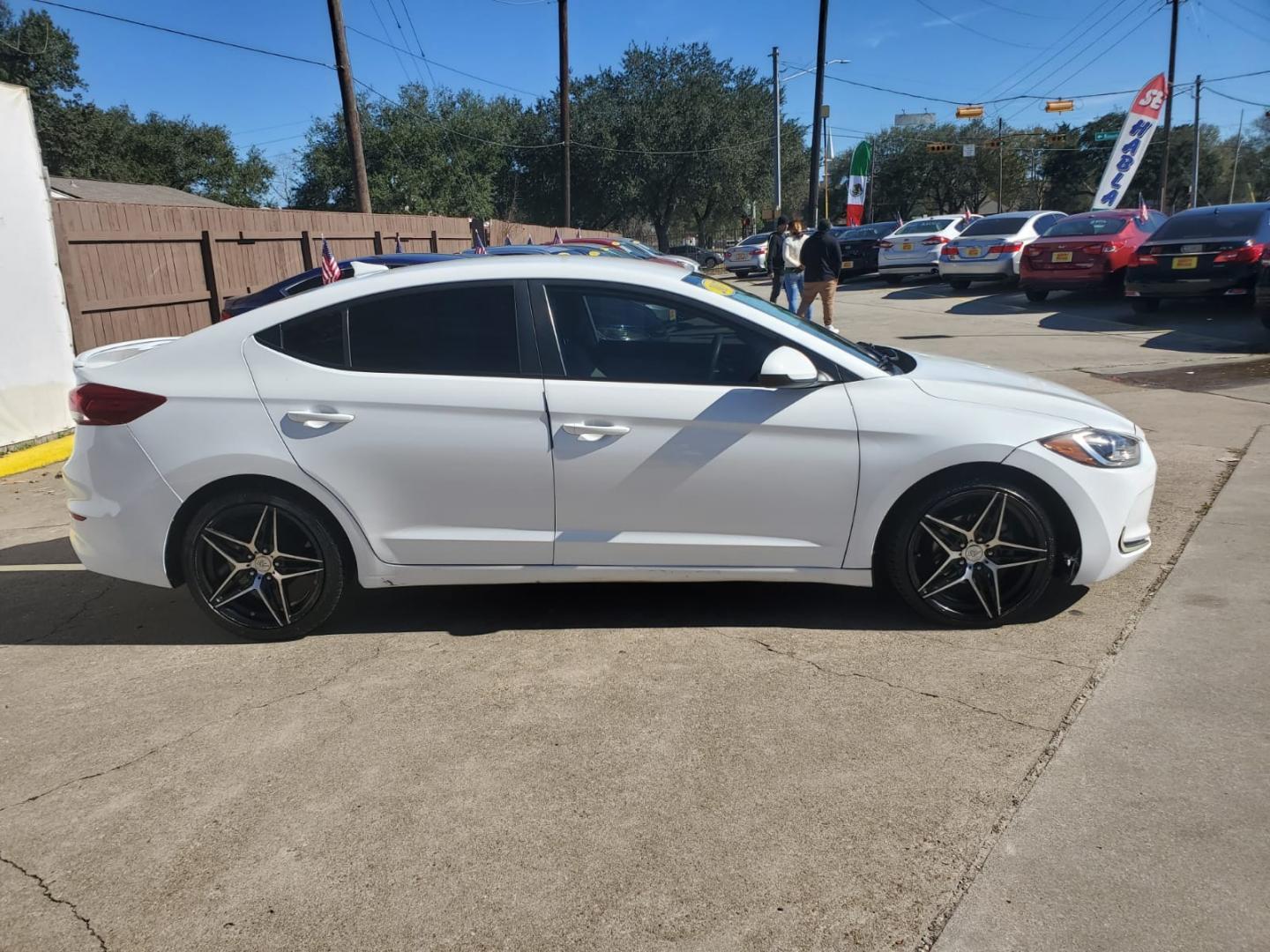 2017 White /Gray Hyundai Elantra SE 6AT (5NPD74LF0HH) with an 1.8L L4 DOHC 16V engine, Automatic 6-Speed transmission, located at 16710 Clay Rd., Houston, TX, 77084, (281) 859-7900, 29.834864, -95.656166 - Low Down. Low Payments. - Photo#4