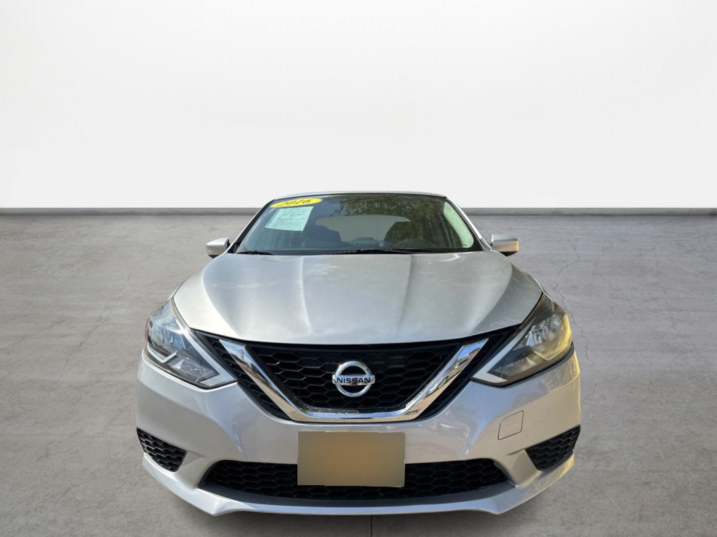 2016 Silver Nissan Sentra FE+ S (3N1AB7AP7GY) with an 1.8L L4 SFI DOHC 16V engine, CVT transmission, located at 16710 Clay Rd., Houston, TX, 77084, (281) 859-7900, 29.834864, -95.656166 - Low Down. Low Payments. - Photo#1