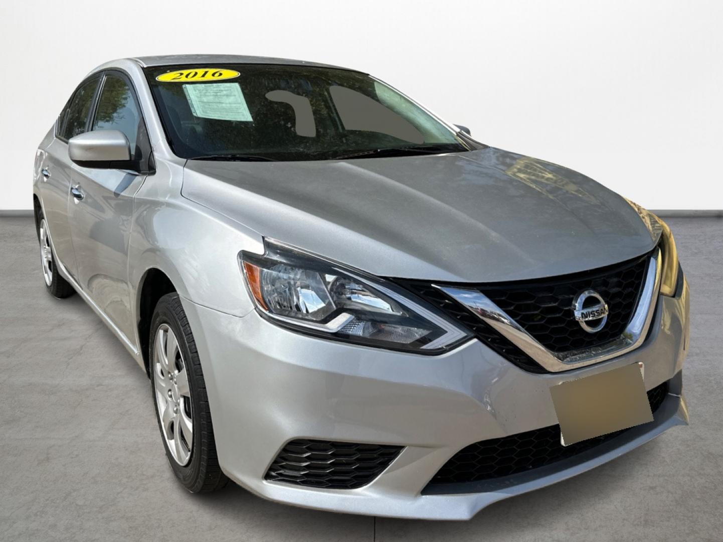2016 Silver Nissan Sentra FE+ S (3N1AB7AP7GY) with an 1.8L L4 SFI DOHC 16V engine, CVT transmission, located at 16710 Clay Rd., Houston, TX, 77084, (281) 859-7900, 29.834864, -95.656166 - Low Down. Low Payments. - Photo#2