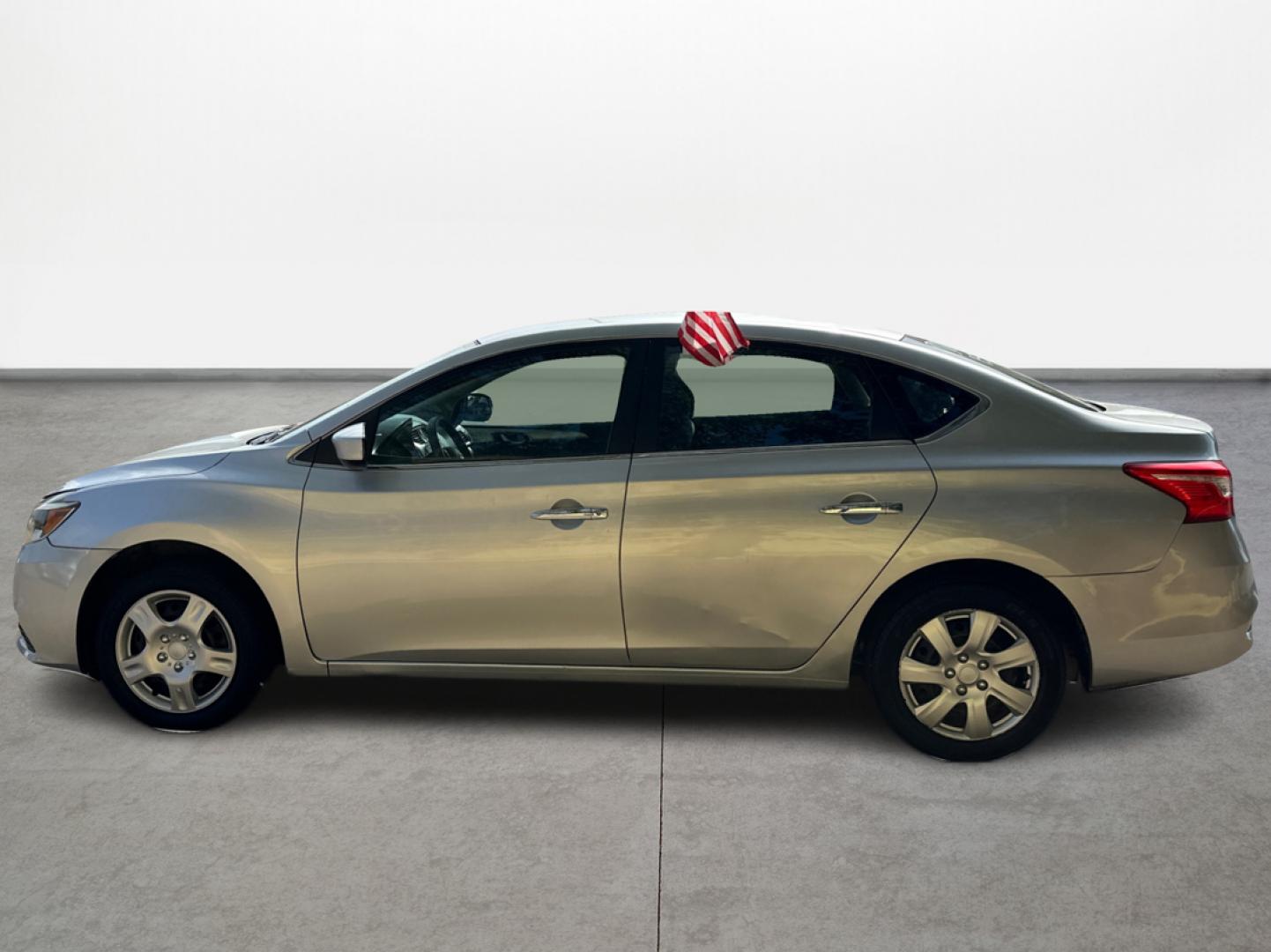 2016 Silver Nissan Sentra FE+ S (3N1AB7AP7GY) with an 1.8L L4 SFI DOHC 16V engine, CVT transmission, located at 16710 Clay Rd., Houston, TX, 77084, (281) 859-7900, 29.834864, -95.656166 - Low Down. Low Payments. - Photo#7