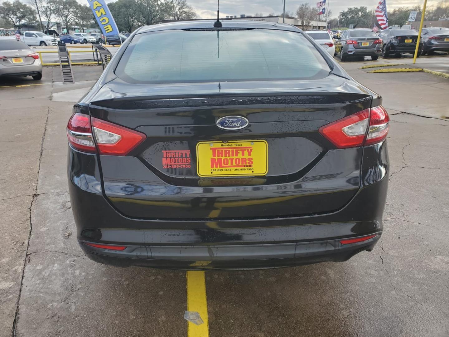 2018 Black Ford Fusion SE (3FA6P0HD6JR) with an 1.5L L4 DOHC 16V engine, 6A transmission, located at 16710 Clay Rd., Houston, TX, 77084, (281) 859-7900, 29.834864, -95.656166 - Low Down. Low Payments. - Photo#5