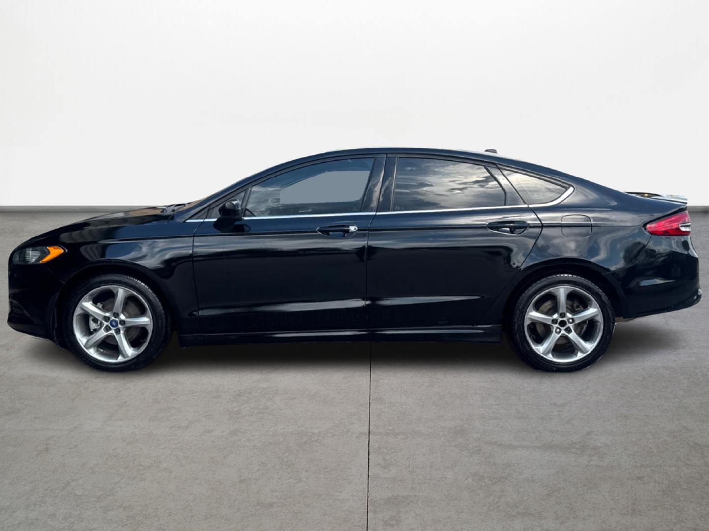 2018 Black Ford Fusion SE (3FA6P0HD6JR) with an 1.5L L4 DOHC 16V engine, 6A transmission, located at 16710 Clay Rd., Houston, TX, 77084, (281) 859-7900, 29.834864, -95.656166 - Low Down. Low Payments. - Photo#7