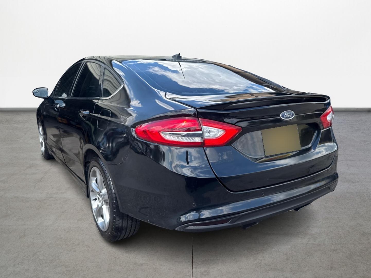 2018 Black Ford Fusion SE (3FA6P0HD6JR) with an 1.5L L4 DOHC 16V engine, 6A transmission, located at 16710 Clay Rd., Houston, TX, 77084, (281) 859-7900, 29.834864, -95.656166 - Low Down. Low Payments. - Photo#6