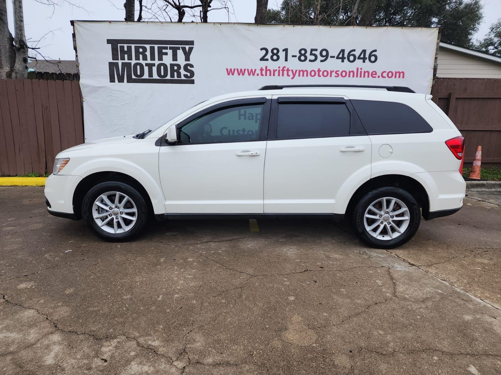 2017 White Dodge Journey SXT (3C4PDCBB5HT) with an 2.4L L6 DOHC 16V engine, 4A transmission, located at 16710 Clay Rd., Houston, TX, 77084, (281) 859-7900, 29.834864, -95.656166 - Photo #0