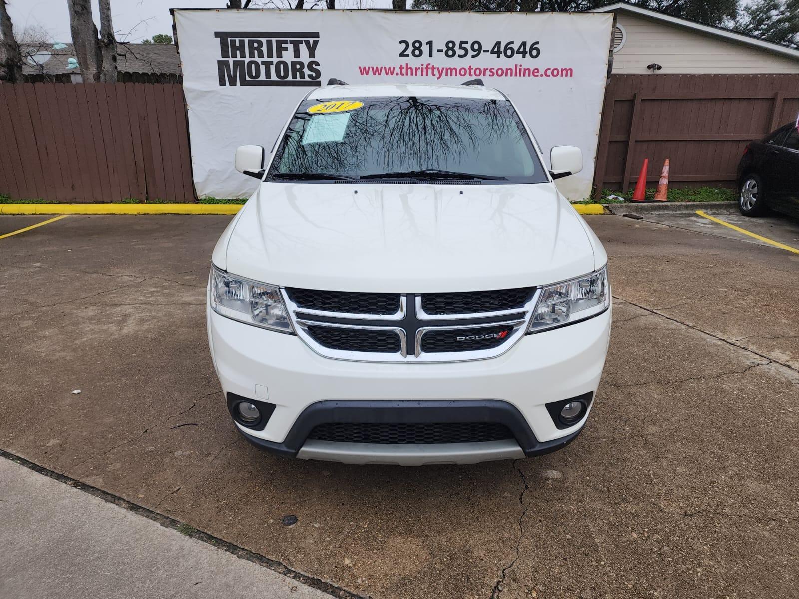 2017 White Dodge Journey SXT (3C4PDCBB5HT) with an 2.4L L6 DOHC 16V engine, 4A transmission, located at 16710 Clay Rd., Houston, TX, 77084, (281) 859-7900, 29.834864, -95.656166 - Low Down. Low Payments. - Photo #1