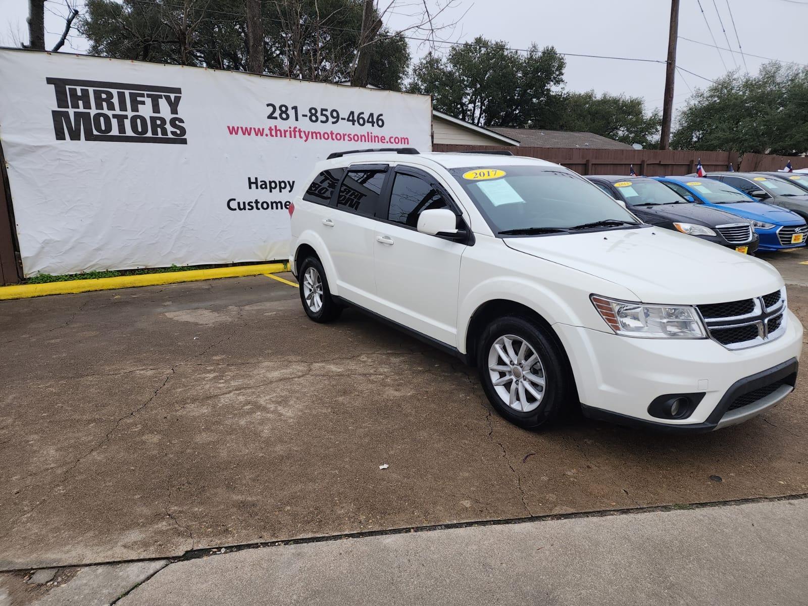 2017 White Dodge Journey SXT (3C4PDCBB5HT) with an 2.4L L6 DOHC 16V engine, 4A transmission, located at 16710 Clay Rd., Houston, TX, 77084, (281) 859-7900, 29.834864, -95.656166 - Low Down. Low Payments. - Photo #2